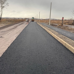 В Калинино началось асфальтирование объездной дороги Абакан - Черногорск 